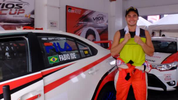 Celebrities at 2017 Toyota Vios Cup Handsome racer standing beside a racing car