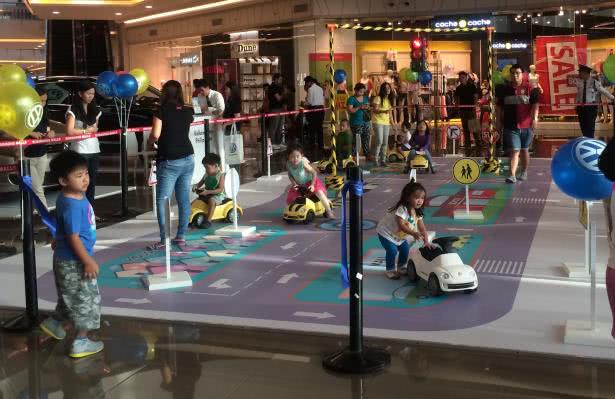 “Steps to Safety” aims to prepare children to become more responsible adult road users Children learning traffic rules through playing with toy cars