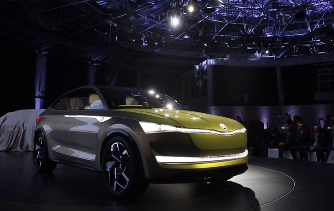 The car also offers twin electric motors, a power output of 225 kilowatts. A brown Vision E displayed at Shanghai Auto show