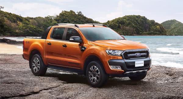 The Ford Ranger has a down payment of as low as PHP 80,000 or PHP 12,888 monthly payment fee, or PHP 40,000 cash discount Orange Ford Ranger angular front view