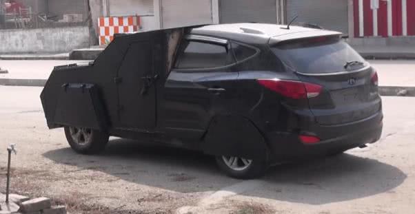 In order to blend with civilian traffic, the ISIS forces have even added some modifications to their SUVs a black Kia SUV with the front modified by ISIS