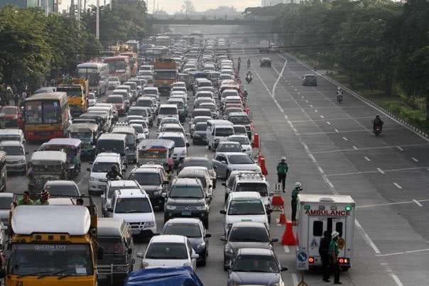 The project, which costs an estimated Php 50 million in total Many cars packed on one lane of an avenue
