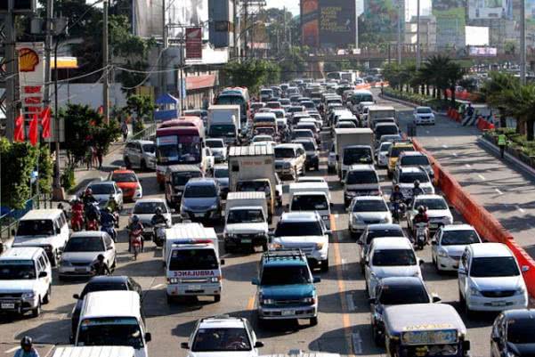 TRAIN seeks to lower personal income tax (PIT) rates and will increase excise taxes on commodities such as automobiles Cars packed on one lane of a avenue
