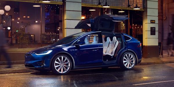 The Model X is the safest, fastest and most capable sport utility vehicle in history. Side view of the blue Tesla Model X SUV