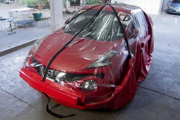 Called as a car-sized bag, it has a capability of protecting a vehicle from flood disasters a car covered with flood-proof bag