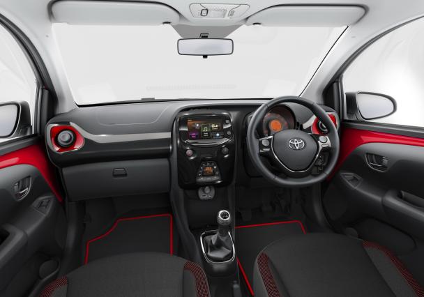 Combo red and black continues to dominate the cabin the Aygo X-cite's cabin