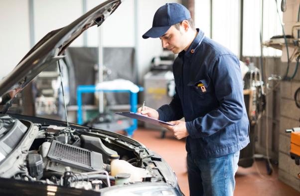 The engine, suspension, brakes and exhaust systems are good places to start checking for mechanical problems A mechanic is checking the car engine