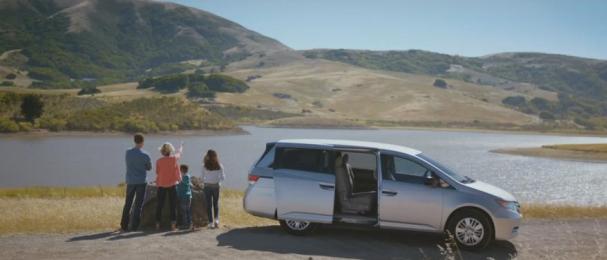 Honda Odyssey parking beside the river