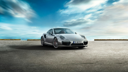 The automatic speedy Porsche 911 proves a good performance Angular front view of silver Porsche 911