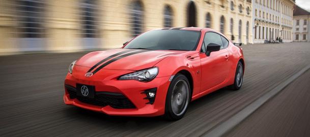 The Toyota 86 is a result of a collaborative effort between Subaru and Toyota Red Toyota 86 on the road