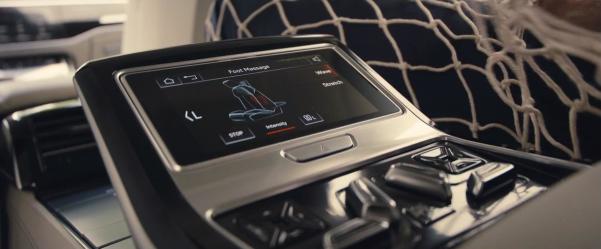 Passengers can change the intensity of foot massage by selecting between “wave” and “stretch” modes touch panel of the foot massaging system in the 2018 Audi A8