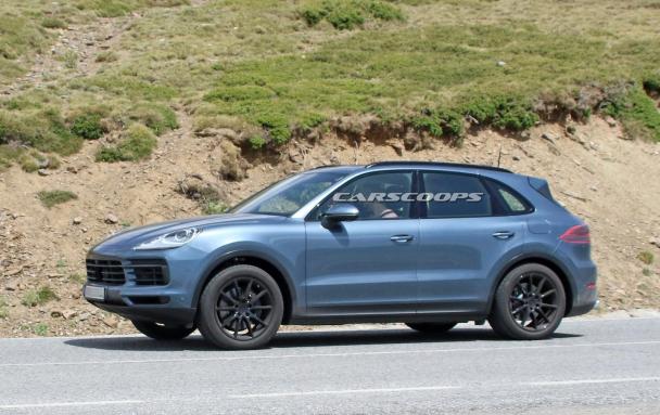 The 2018 Porsche Cayenne looks less bulky, actually, more streamlined with a sportier roofline and smaller windows behind the rear doors side view of the 2018 Porsche Cayenne