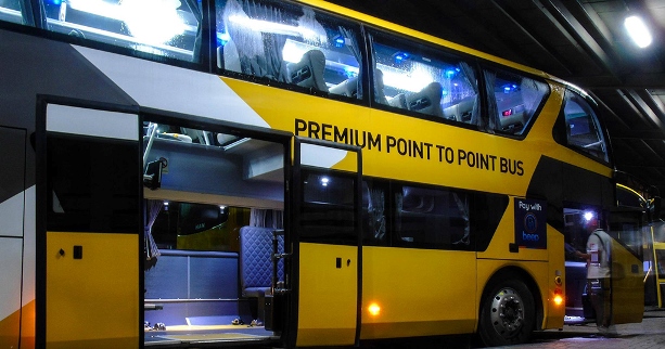 Aside from the prime bus features, the P2P service’s key selling point remains its value to consumers who want a cheaper but relatively fast commute A yellow premium point-to-point bus