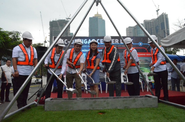 The groundbreaking ceremony for the BGC-Ortigas Link Road People standing and holding shovel in a ground breaking ceremony