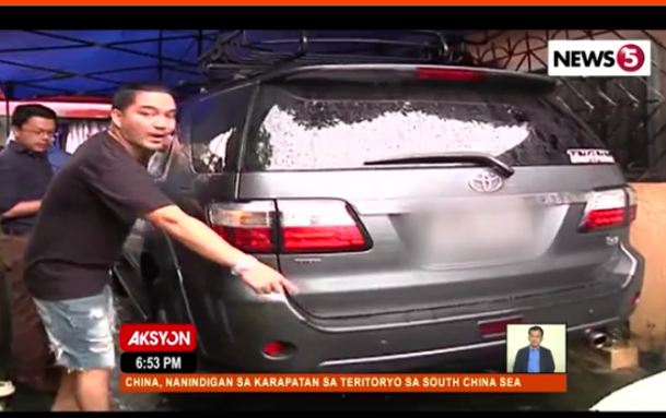  Tong Santos, a Toyota Fortuner owner, railed against Toyota Fairview’s staffs in Quezon City for causing even more damage on his Fortuner A man checking the back portion of his car