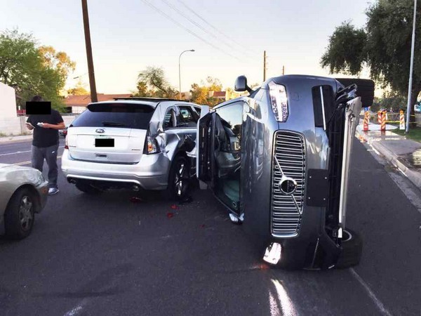 An Uber self-driving car kills a pedestrian in Arizona