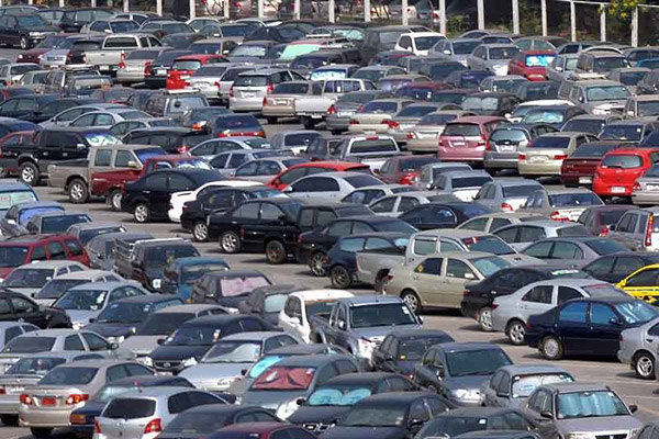 a car parking lot filled with ordinary cars