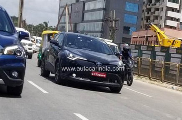 Toyota C-HR 2018 with no camo shows its badges during test mule on Indian roads