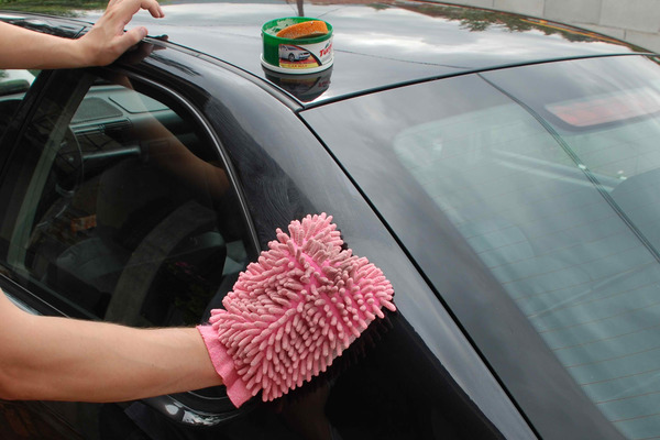 Man waxing the car