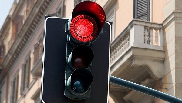 a red traffic signal light means that you must