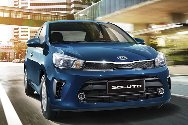 A picture of the Kia Soluto 2019 travelling on a city road