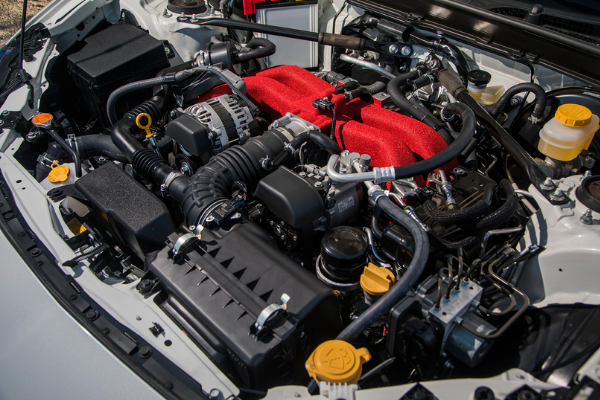 The BRZ is powered by a 2 liter flat four four cylinder boxer engine from Subaru Subaru BRZ Engine Bay