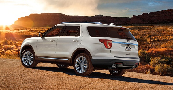 The revised and updated 2019 Ford Explorer also has a lot in the way of road prescence A picture of a white 2019 Ford Explorer rear view