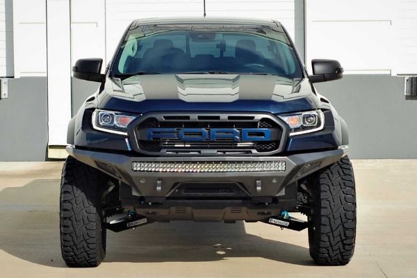 From the front, they turned a stock Ford Ranger Lariat into a very wide and beefy vehicle Ford Ranger Lariat FX4 like a Raptor
