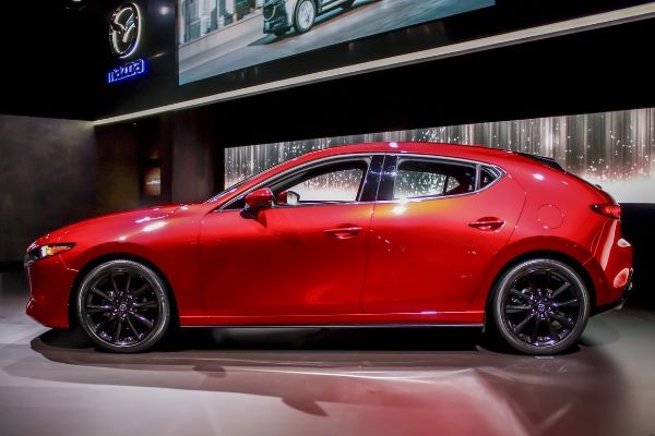 While the Mazda 3 is larger and more expensive, its definitely more fun to drive. A picture of the side of the Mazda 3