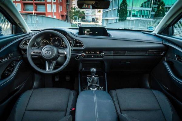 The list of interior features might be more basic but it's still a well-arranged space A picture of the CX-30's interior.