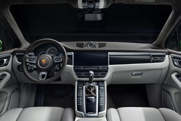 Check out the Macan's fancy interior. Note the larger touchscreen and the stopwatch on top of the dash A picture of the Macan's interior