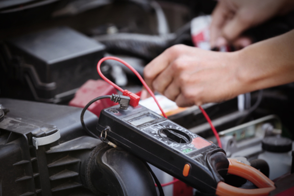 Man checking the car battery