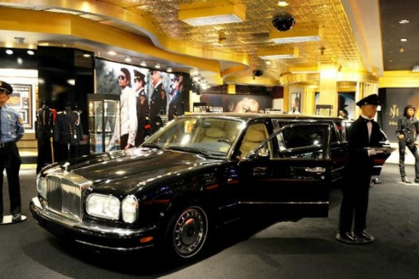 A black Rolls Royce Silver Spur II Limousine 