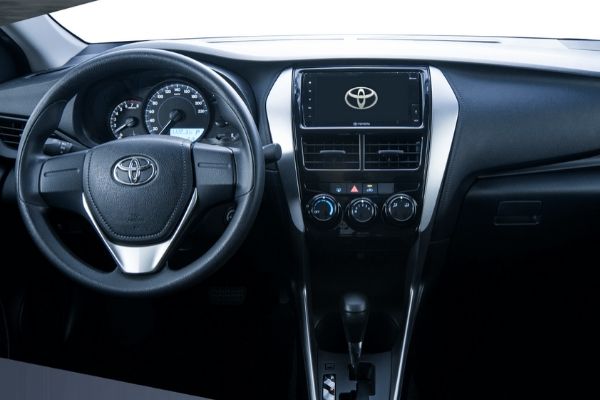The layout inside the Vios is simple enough but it's also... A picture of the dashboard of the Toyota Vios