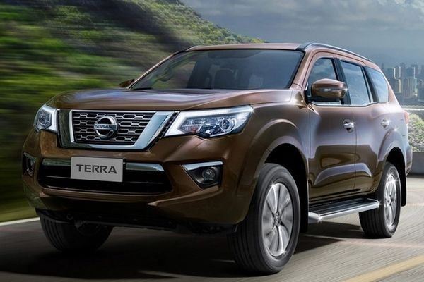 The Nissan Terra is a bit smaller, but otherwise it's still a very macho vehicle A picture of the Nissan Terra going fast over a hill