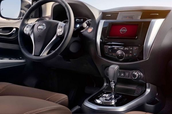 The front cabin of the Terra looks like the one aboard the Navara A picture of the dashboard and steering wheel of the Nissan Terra