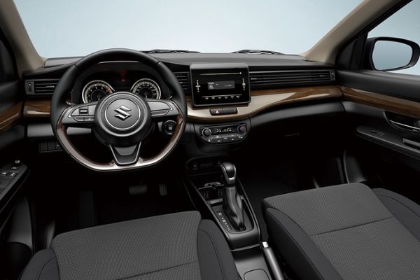 The Ertiga is pretty well arranged too but some of you might not like the faux wood A picture of the interior of the Suzuki Ertiga