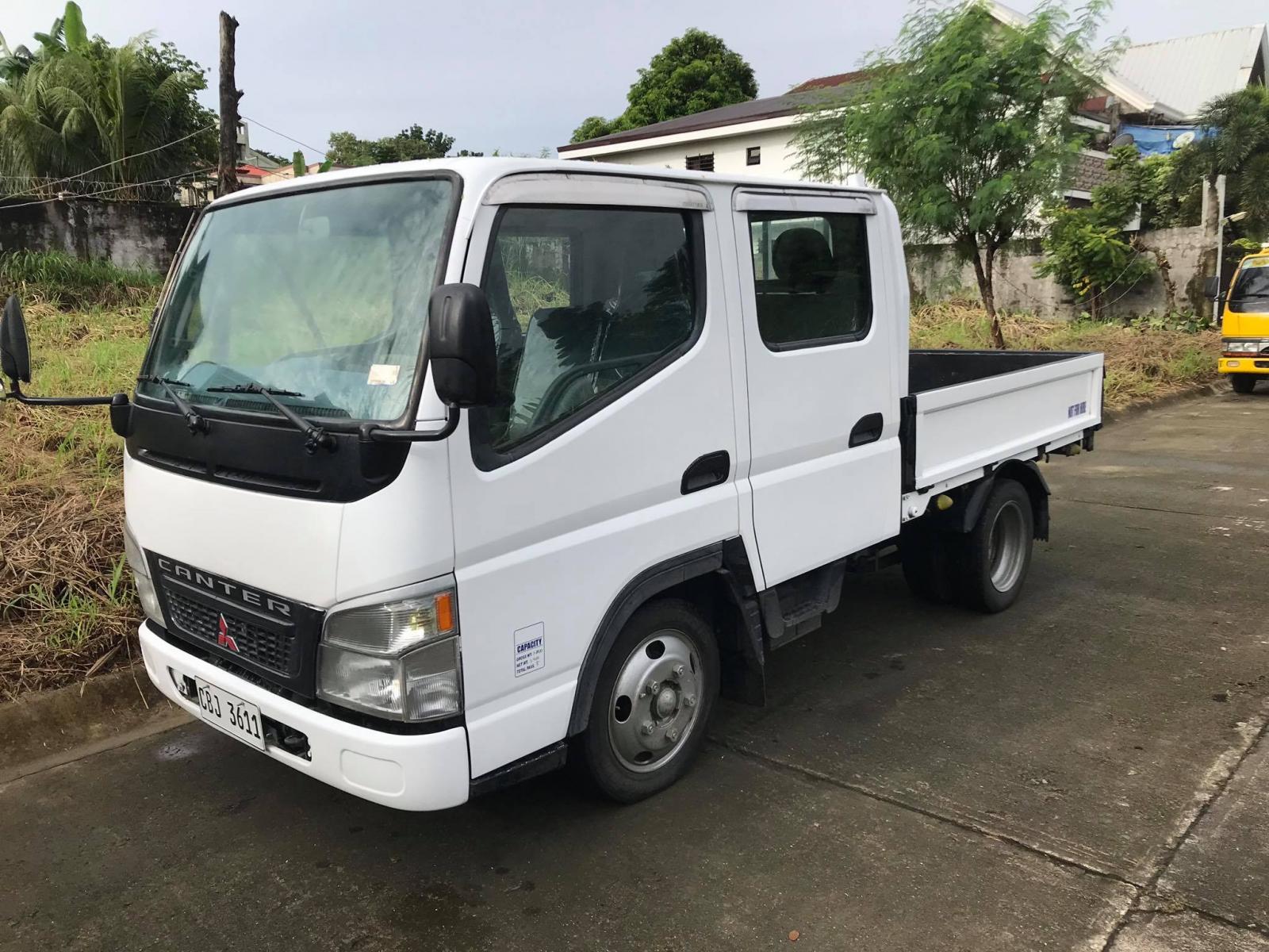 Фото mitsubishi fuso canter