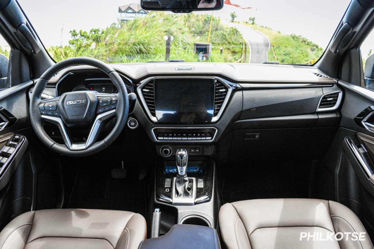 A picture of the 2021 D-Max's interior featuring the steering wheel and dashboard