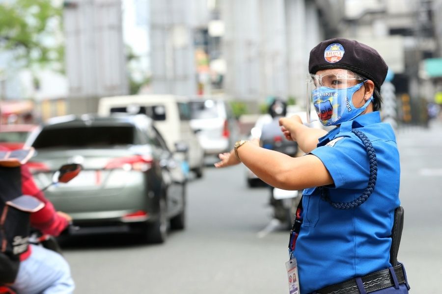 What should you do when you’re flagged down by a traffic enforcer?  