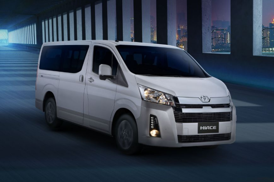 A picture of a Toyota Hiace travelling on a 3D rendered space.