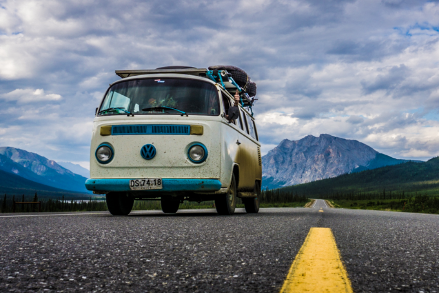 A picture of a Volkswagen Kombi on the road.