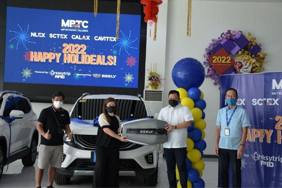 MPTC awards brand-new Geely Okavango to two Easytrip RFID users