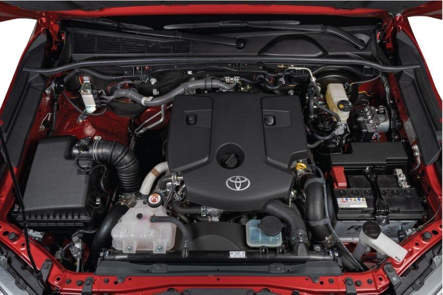 A picture of the Toyota Hilux Conquest's engine bay showing its engine