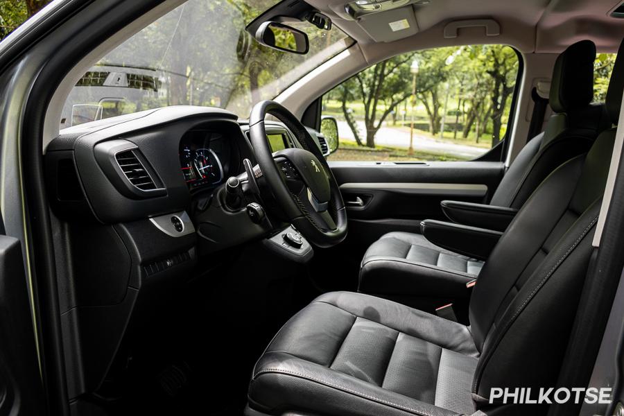 A picture of the interior showing the paddle shifters on the steering column