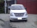 2011 hyundai grand starex . 2011 ford fiesta-1