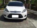 2011 hyundai grand starex . 2011 ford fiesta-3