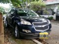 2013 chevrolet traverse v explorer-0