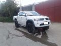 2007 mitsubishi strada 4x4 2016 toyota vios-1