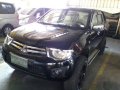 Mitsubishi Strada 2011 truckl black manual for sale -4